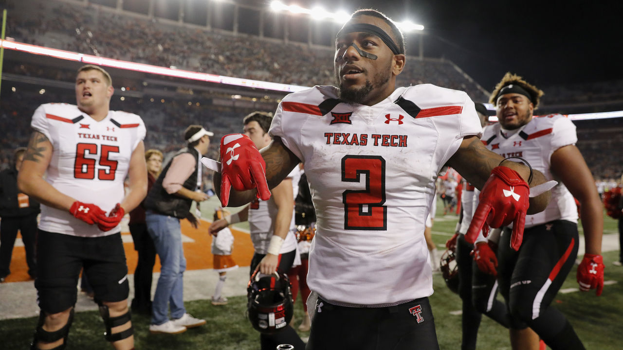 AUSTIN, TX - NOVEMBER 24: Keke Coutee #2 of the Texas Tech Red Raiders celebrates with teammates after the game against the Texas Longhorns at Darrell K Royal-Texas Memorial Stadium on November 24, 2017 in Austin, Texas.