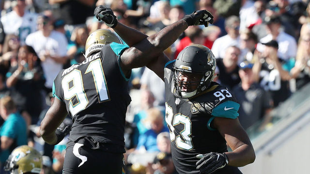 JACKSONVILLE, FL - DECEMBER 17: Calais Campbell #93 and Yannick Ngakoue #91 of the Jacksonville Jaguars celebrate a play during the second half of their game against the Houston Texans at EverBank Field on December 17, 2017 in Jacksonville, Florida.