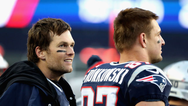 FOXBORO, MA - DECEMBER 24: Tom Brady #12 and Rob Gronkowski #87 of the New England Patriots look on during the fourth quarter of a game against the Buffalo Bills at Gillette Stadium on December 24, 2017 in Foxboro, Massachusetts.