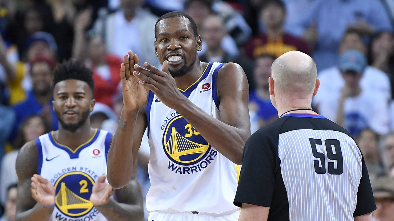 OAKLAND, CA - DECEMBER 25: Kevin Durant #35 of the Golden State Warriors reacts after blocking the shot of LeBron James #23 of the Cleveland Cavaliers late in the fouth quarter of an NBA basketball game at ORACLE Arena on December 25, 2017 in Oakland, California.