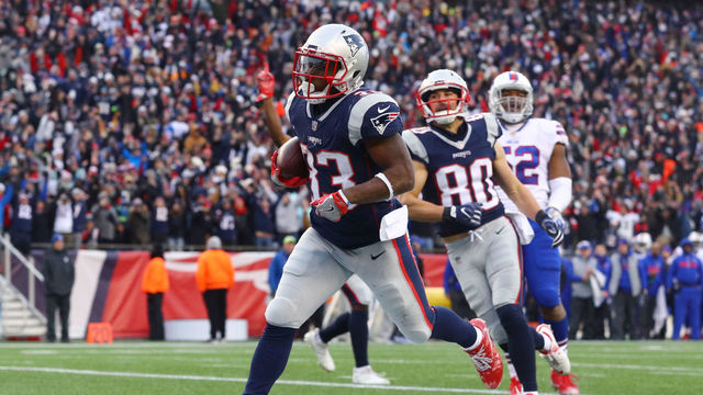 FOXBORO, MA - DECEMBER 24: Dion Lewis #33 of the New England Patriots scores a touchdown against the Buffalo Bills during the first half at Gillette Stadium on December 24, 2017 in Foxboro, Massachusetts.