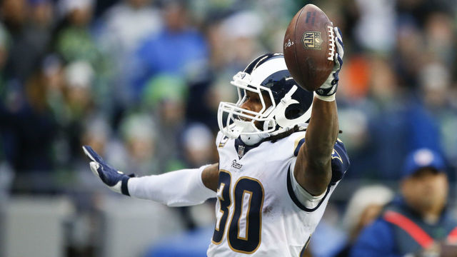 SEATTLE, WA - DECEMBER 17: Running back Todd Gurley #30 of the Los Angeles Rams celebrates a touchdown against the Seattle Seahawks in the third quarter of the game at CenturyLink Field on December 17, 2017 in Seattle, Washington.