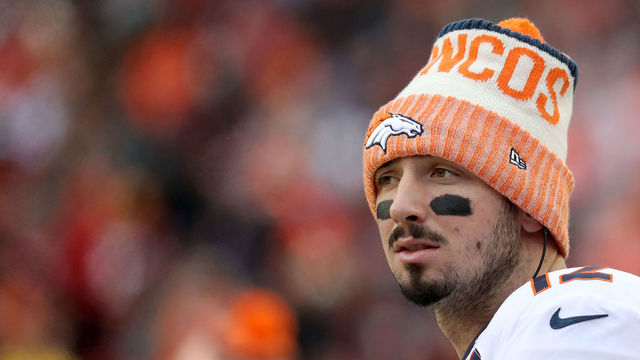 LANDOVER, MD - DECEMBER 24: Quarterback Paxton Lynch #12 of the Denver Broncos looks on from the sidelines in the second half against the Washington Redskins at FedExField on December 24, 2017 in Landover, Maryland.