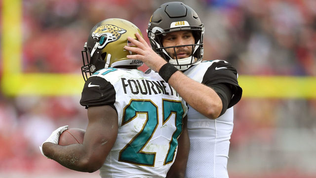 SANTA CLARA, CA - DECEMBER 24: Leonard Fournette #27 of the Jacksonville Jaguars is congratulated by Blake Bortles #5 after Fournette scored on a 1-yard touchdown run against the San Francisco 49ers during their NFL football game at Levi's Stadium on December 24, 2017 in Santa Clara, California.