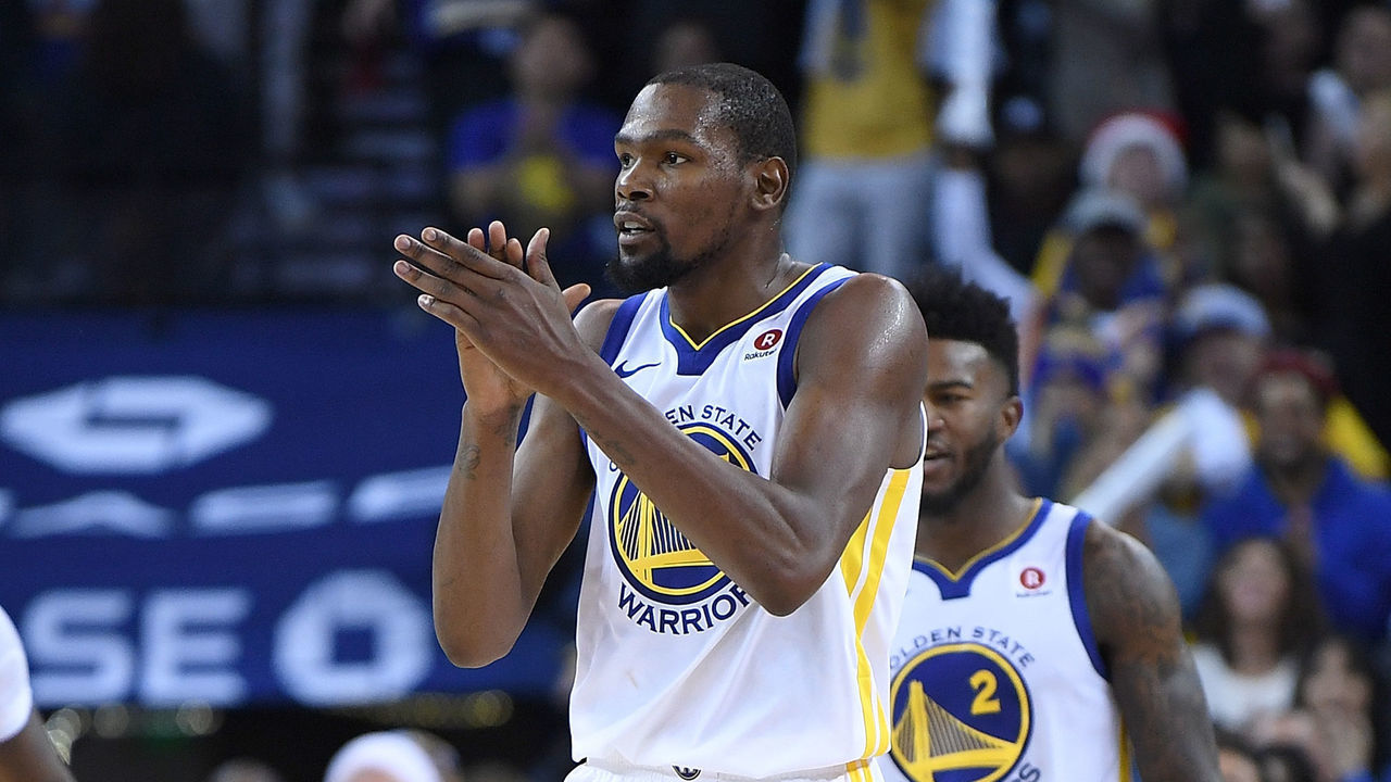 OAKLAND, CA - DECEMBER 25: Kevin Durant #35 of the Golden State Warriors reacts after blocking the shot of LeBron James #23 of the Cleveland Cavaliers late in the fouth quarter of an NBA basketball game at ORACLE Arena on December 25, 2017 in Oakland, California.