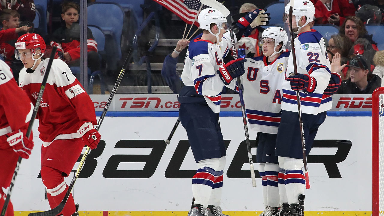 BUFFALO, NY - DECEMBER 26: Kailer Yamamoto #17 of United States celebrates his goal against Denmark with Brady Tkachuk #7 and Logan Brown #22 in the first period during the IIHF World Junior Championship at KeyBank Center on December 26, 2017 in Buffalo, New York.