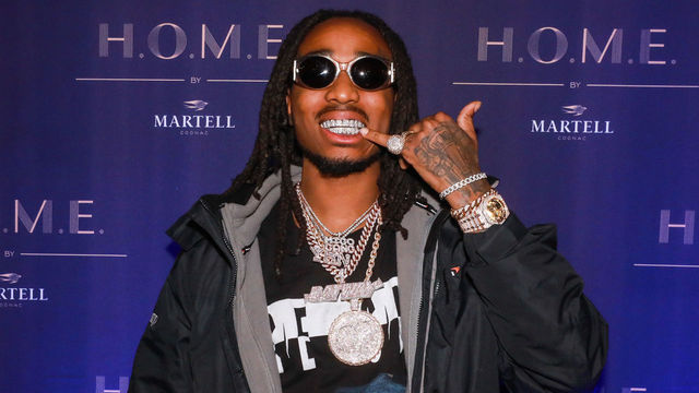 DETROIT, MI - NOVEMBER 29: Rapper Quavo poses with bottle af Martell at the H.O.M.E. by Martell event on November 29, 2017 in Detroit, Michigan.