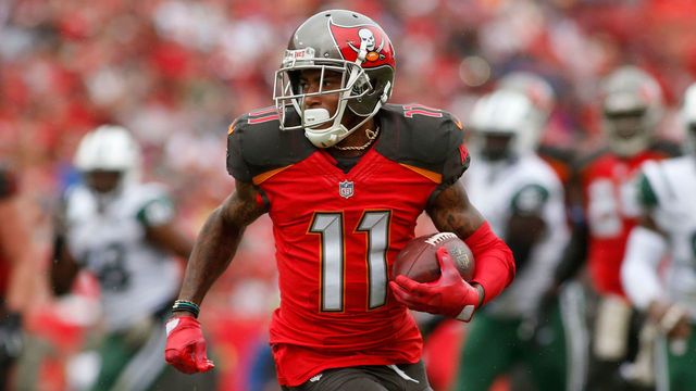 TAMPA, FL - NOVEMBER 12: Wide receiver DeSean Jackson #11 of the Tampa Bay Buccaneers runs for a first down during the first quarter of an NFL football game against the New York Jets on November 12, 2017 at Raymond James Stadium in Tampa, Florida.