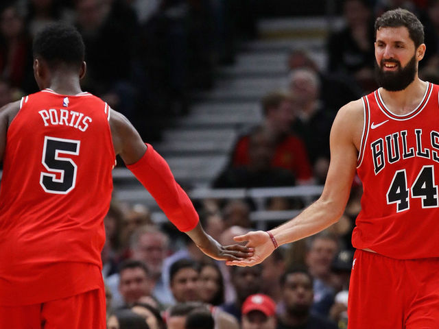 CHICAGO, IL - DECEMBER 18: Nikola Mirotic #44 and Bobby Portis #5 of the Chicago Bulls congratulate each other after a play against the Philadelphia 76ers at the United Center on December 18, 2017 in Chicago, Illinois. The Bulls defeated the 76ers 117-115.