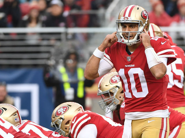 SANTA CLARA, CA - DECEMBER 24: Jimmy Garoppolo #10 of the San Francisco 49ers signalsto his team during their NFL game against the Jacksonville Jaguars at Levi's Stadium on December 24, 2017 in Santa Clara, California.