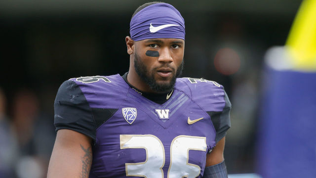 SEATTLE, WA - SEPTEMBER 09: Linebacker Azeem Victor #36 of the Washington Huskies looks on prior to the game against the Montana Grizzlies at Husky Stadium on September 9, 2017 in Seattle, Washington.