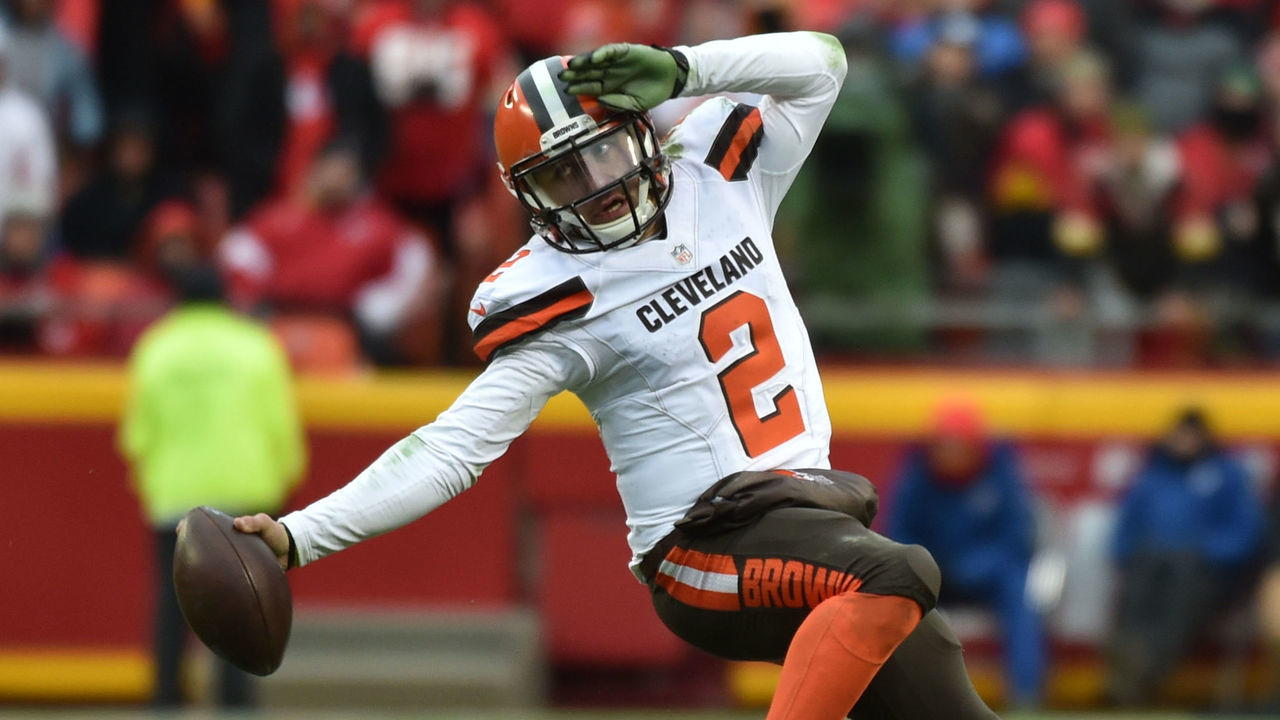 KANSAS CITY, MO - DECEMBER 27: Johnny Manziel #2 of the Cleveland Browns fights his way out of a tackle attempt from Derrick Johnson #56 of the Kansas City Chiefs at Arrowhead Stadium during the fourth quarter of the game on December 27, 2015 in Kansas City, Missouri.