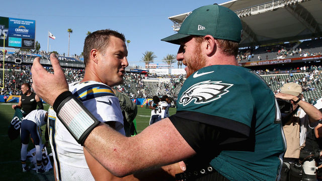 CARSON, CA - OCTOBER 01: Philip Rivers #17 of the Los Angeles Chargers talks with Carson Wentz #11 of the Philadelphia Eagles after a game at StubHub Center on October 1, 2017 in Carson, California. The Philadelphia Eagles defeated the Los Angeles Chargers 26-24.