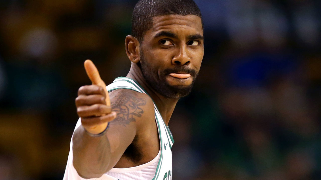 BOSTON, MA - OCTOBER 2: Kyrie Irving #11 of the Boston Celtics gives a thumbs up during the first half against the Charlotte Hornets at TD Garden on October 2, 2017 in Boston, Massachusetts.