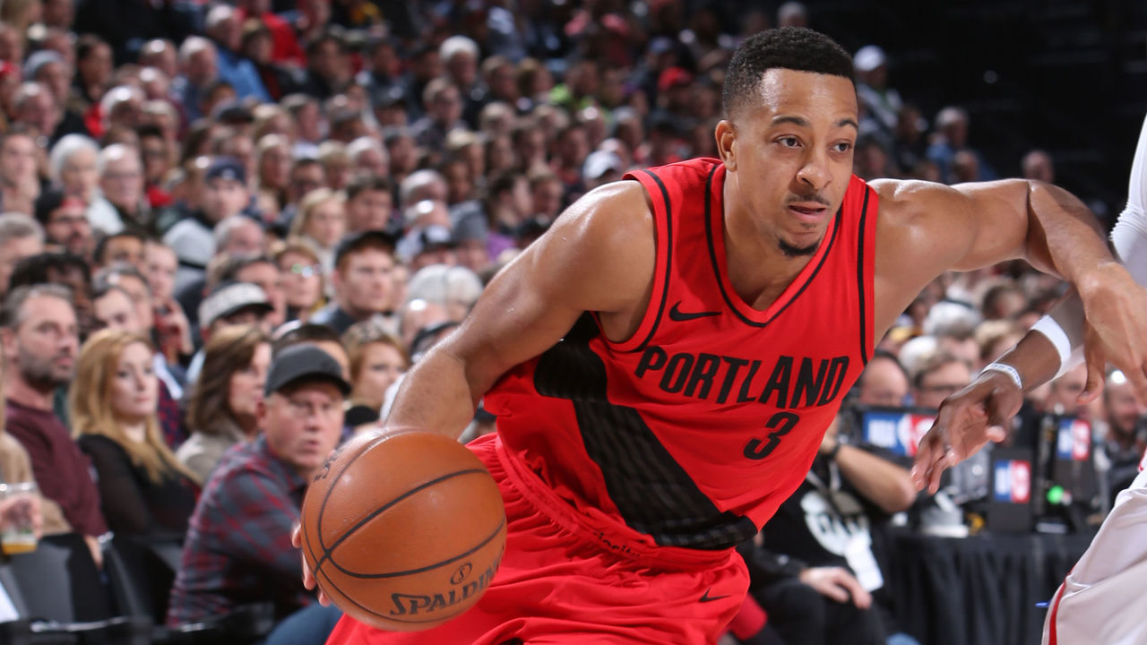 PORTLAND, OR - DECEMBER 28: CJ McCollum #3 of the Portland Trail Blazers handles the ball against the Philadelphia 76ers on December 28, 2017 at the Moda Center in Portland, Oregon. Mandatory Copyright Notice: Copyright 2017 NBAE