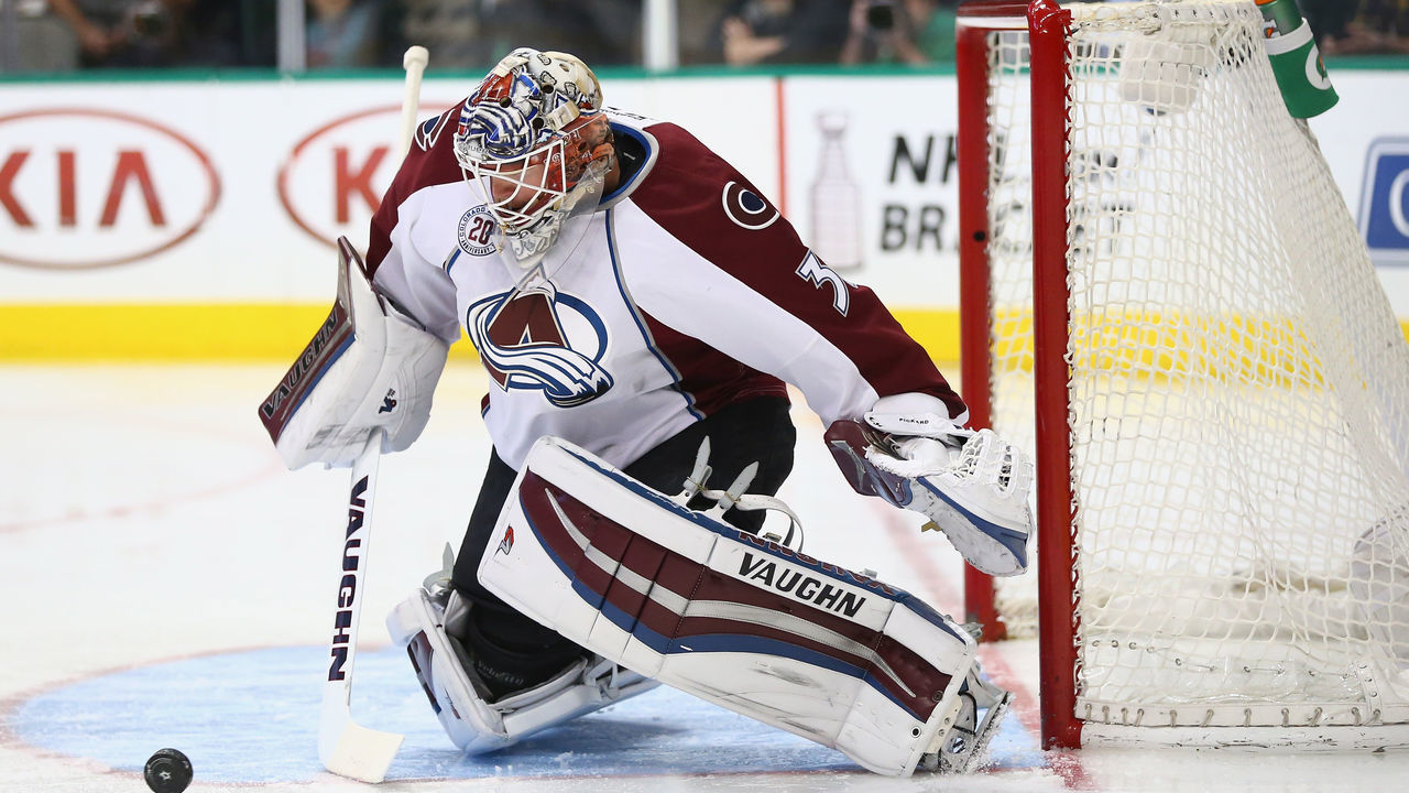 DALLAS, TEXAS - APRIL 07: Calvin Pickard #31 of the Colorado Avalanche makes a save against the Dallas Stars in the first period at American Airlines Center on April 7, 2016 in Dallas, Texas.