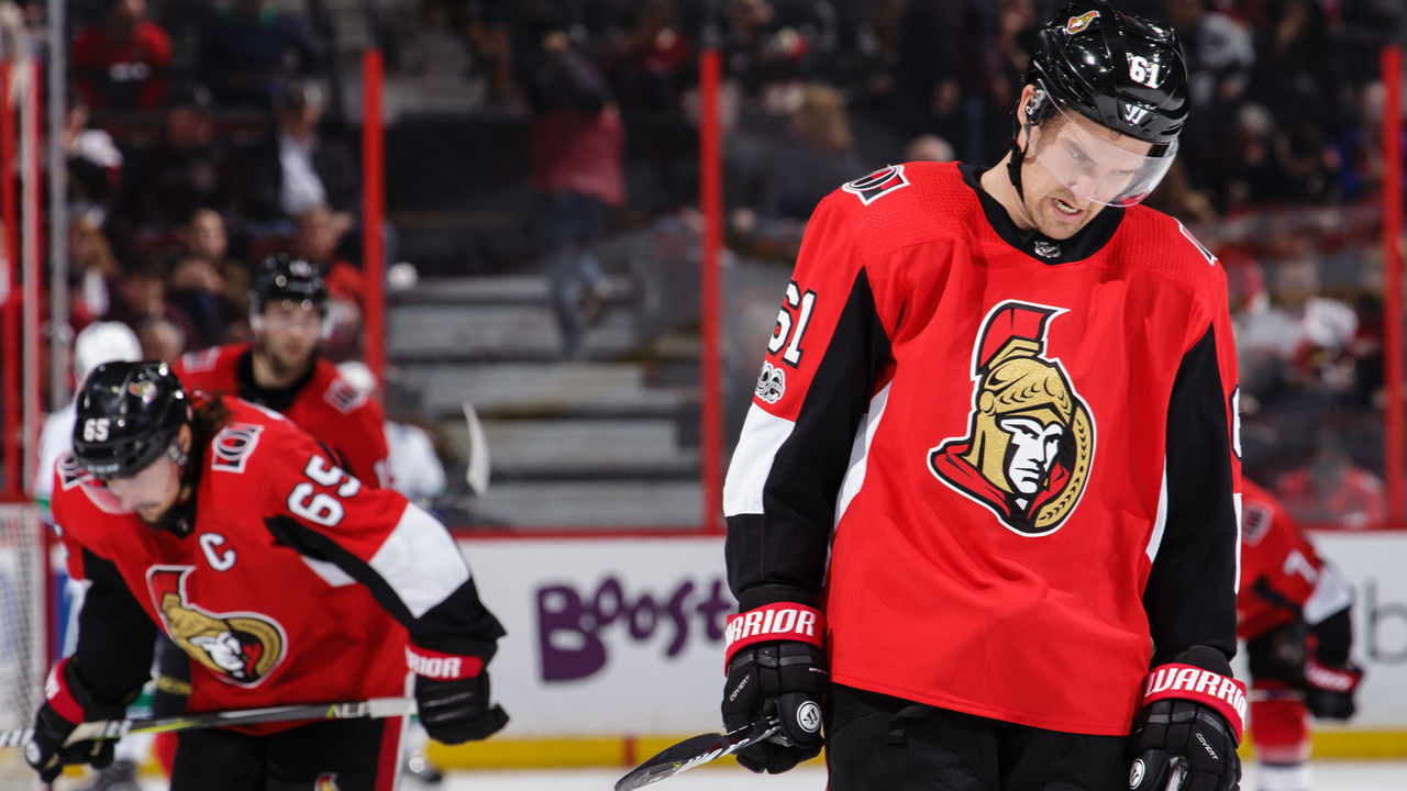 OTTAWA, ON - OCTOBER 17: Mark Stone #61 and Erik Karlsson #65 of the Ottawa Senators react after losing to the Vancouver Canucks at Canadian Tire Centre on October 17, 2017 in Ottawa, Ontario, Canada. *** Local Caption ***