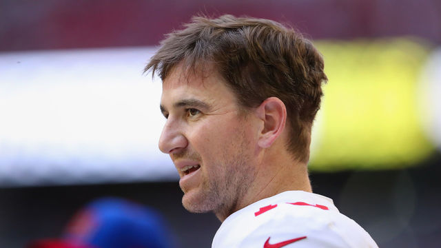 GLENDALE, AZ - DECEMBER 24: Quarterback Eli Manning #10 of the New York Giants watches from the sidelines during the first half of the NFL game against the Arizona Cardinals at the University of Phoenix Stadium on December 24, 2017 in Glendale, Arizona. The Cardinals defeated the Giants 23-0.
