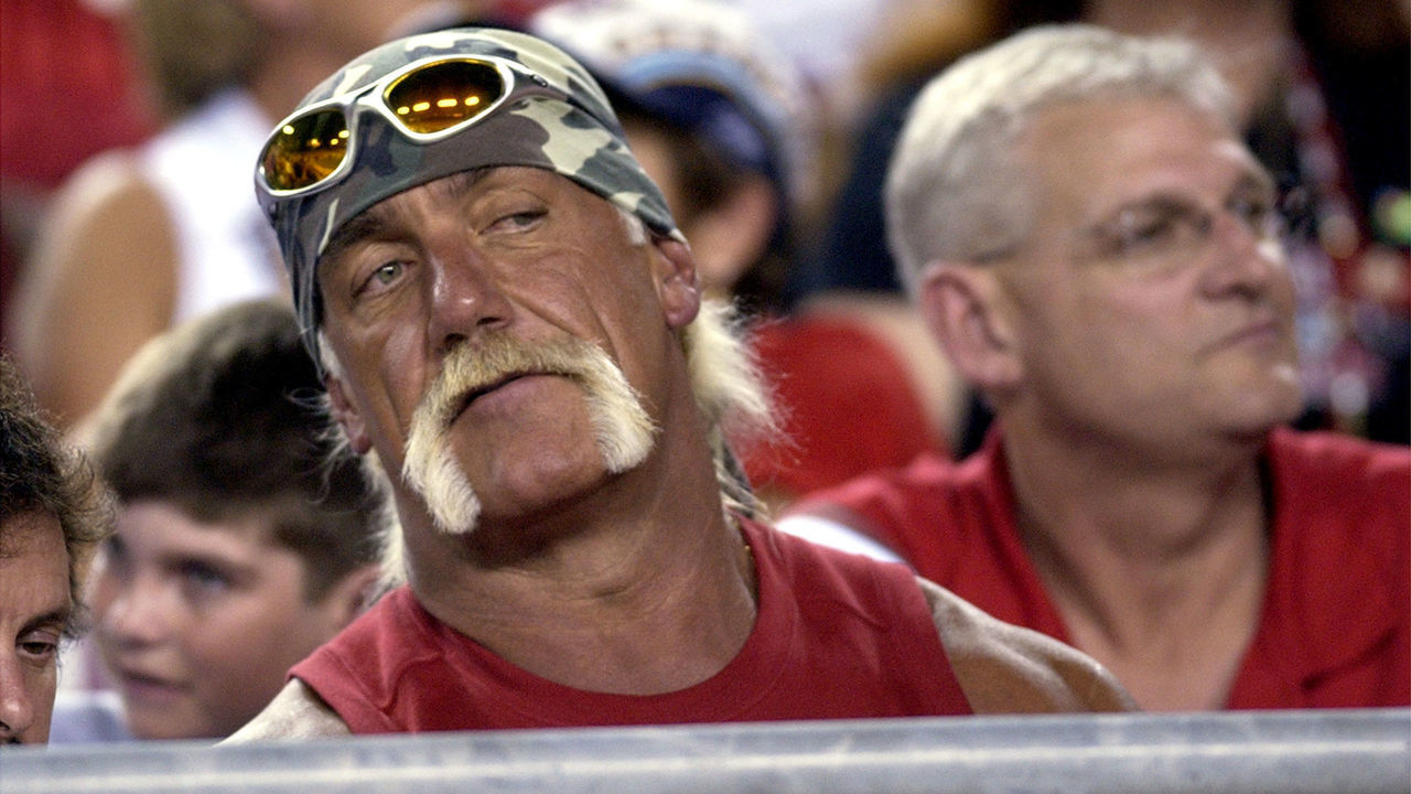 Hulk Hogan follows the play from a front-row seat during the second quarter August 23, 2003 at Raymond James Stadium, Tampa. The Tampa Bay Buccaneers defeated the Jacksonville Jaguars 10 - 6 in pre-season play.