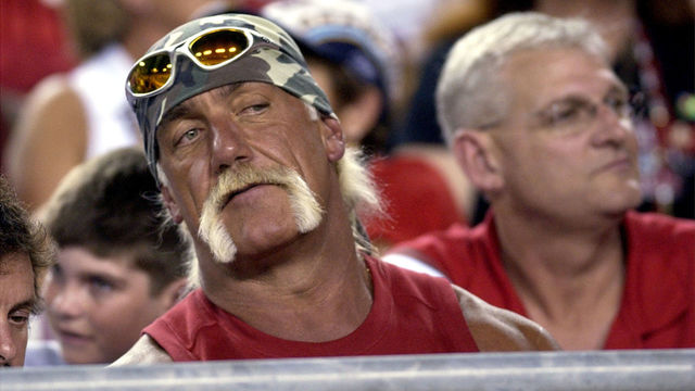 Hulk Hogan follows the play from a front-row seat during the second quarter August 23, 2003 at Raymond James Stadium, Tampa. The Tampa Bay Buccaneers defeated the Jacksonville Jaguars 10 - 6 in pre-season play.