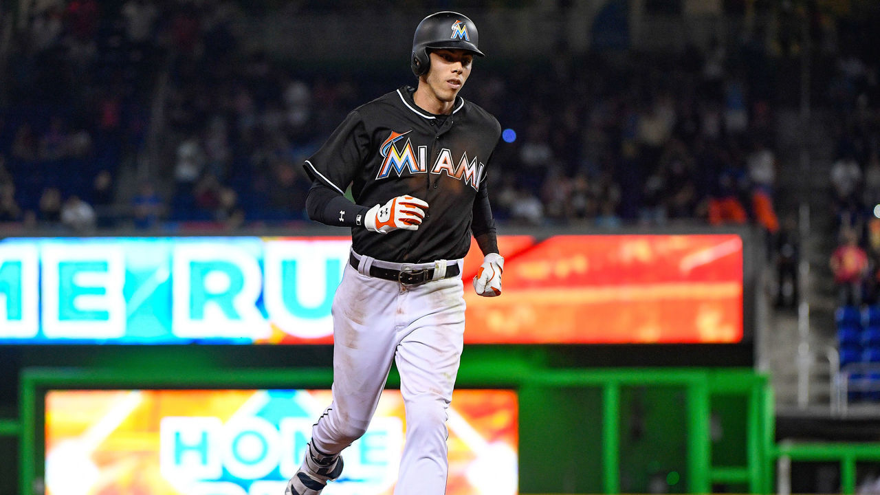 MIAMI, FL - APRIL 15: Christian Yelich #21 of the Miami Marlins hits a a 2 run homer eighth inning during the game between the Miami Marlins and the New York Mets at Marlins Park on April 15, 2017 in Miami, Florida. All players are wearing #42 in honor of Jackie Robinson Day.