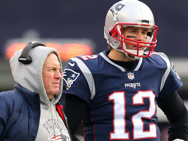 FOXBORO, MA - DECEMBER 24: Head coach Bill Belichick of the New England Patriots stands with Tom Brady #12 during the second half against the Buffalo Bills at Gillette Stadium on December 24, 2017 in Foxboro, Massachusetts.