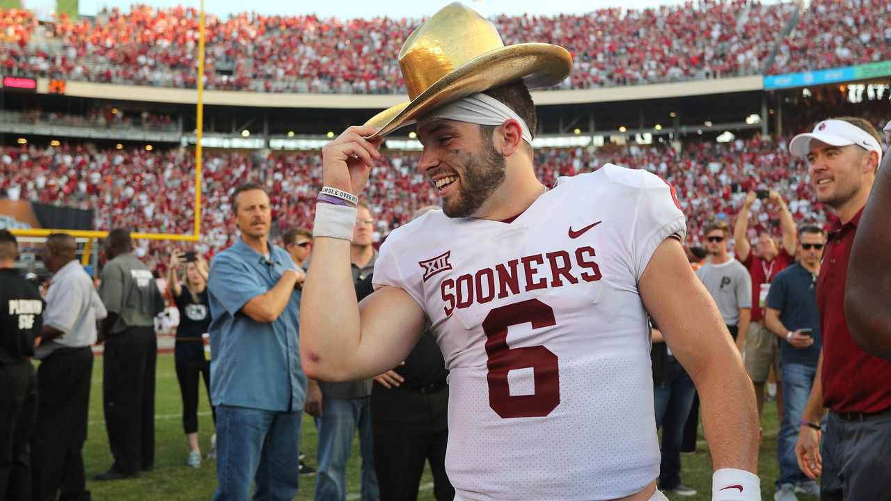 DALLAS, TX - OCTOBER 14: Baker Mayfield #6 of the Oklahoma Sooners wears the Golden Hat Trophy after the 29-24 win over the Texas Longhorns at Cotton Bowl on October 14, 2017 in Dallas, Texas.