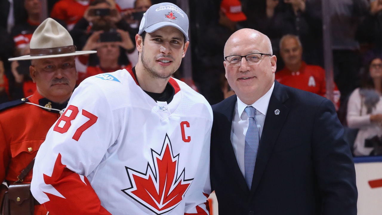 TORONTO, ON - SEPTEMBER 29: Sidney Crosby #87 of Team Canada is awarded the World Cup of Hockey MVP trophy by Bill Daly following a 2-1 victory over Team Canada at the Air Canada Centre on September 29, 2016 in Toronto, Canada.