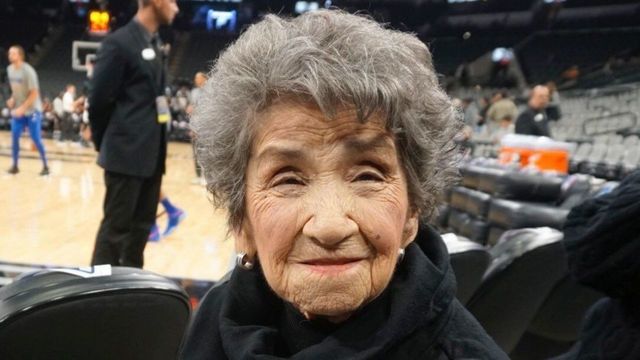 Spurs fan surprised with courtside seats for 100th birthday