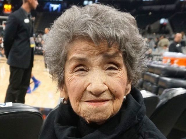 Spurs fan surprised with courtside seats for 100th birthday