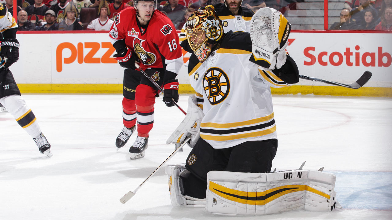 OTTAWA, ON - APRIL 21: Tuukka Rask #40 of the Boston Bruins makes a save as teammate Dominic Moore #28 defends against Ryan Dzingel #18 of the Ottawa Senators in the second period in Game Five of the Eastern Conference First Round during the 2017 NHL Stanley Cup Playoffs at Canadian Tire Centre on April 21, 2017 in Ottawa, Ontario, Canada.