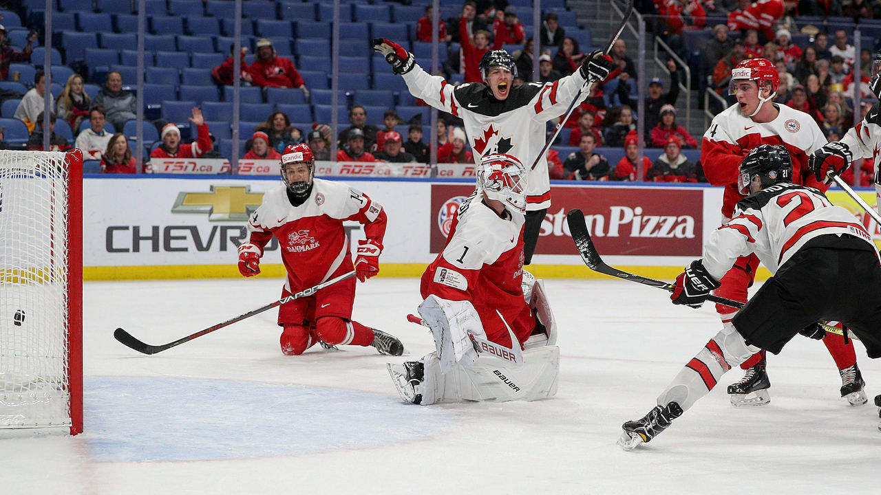 BUFFALO, NY - DECEMBER 30: Brett Howden #21 of Canada scores a goal past Emil Gransoe #1 of Denmark to give Cananda a 2-0 lead during the first period of play in the IIHF World Junior Championships at the KeyBank Center on December 30, 2017 in Buffalo, New York.
