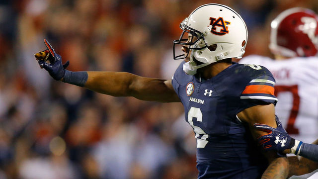 AUBURN, AL - NOVEMBER 25: Carlton Davis #6 of the Auburn Tigers celebrates after making a tackle during the fourth quarter against the Alabama Crimson Tide at Jordan Hare Stadium on November 25, 2017 in Auburn, Alabama.