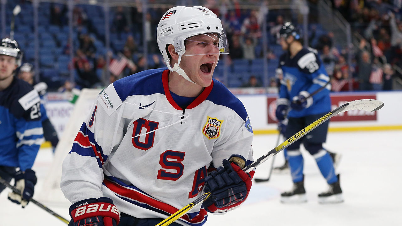 BUFFALO, NY - DECEMBER 31: Adam Fox #8 of United States celebrates after scoring the winning goal against Finland in the third period during the IIHF World Junior Championship at KeyBank Center on December 31, 2017 in Buffalo, New York.