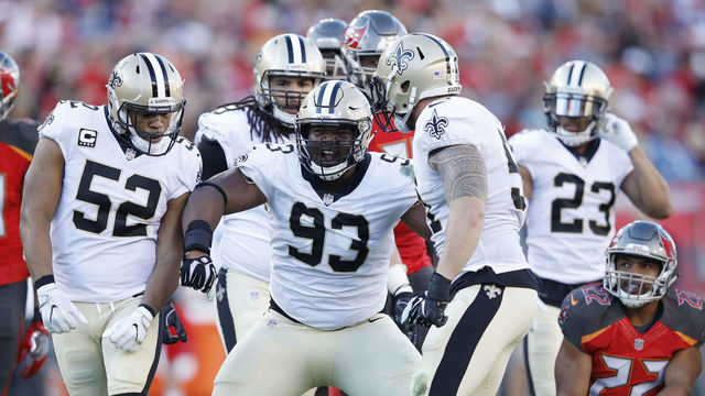 TAMPA, FL - DECEMBER 31: David Onyemata #93 of the New Orleans Saints reacts after making a tackle for loss against Doug Martin #22 of the Tampa Bay Buccaneers in the first quarter of a game at Raymond James Stadium on December 31, 2017 in Tampa, Florida.
