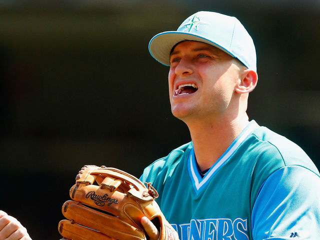 NEW YORK, NY - AUGUST 27: Kyle Seager #15 of the Seattle Mariners reacts after commiting an error in the first inning against the New York Yankees at Yankee Stadium on August 27, 2017 in the Bronx borough of New York City.