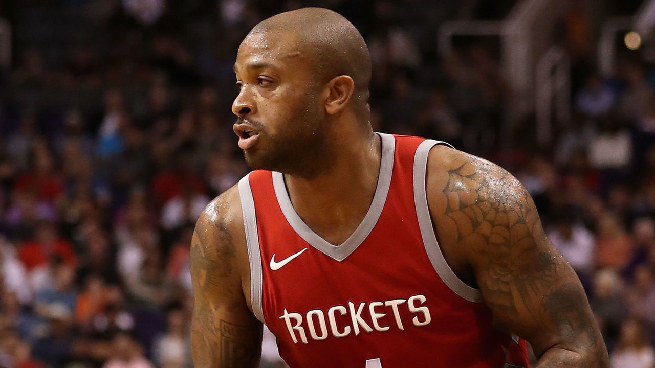 PHOENIX, AZ - NOVEMBER 16: PJ Tucker #4 of the Houston Rockets handles the ball during the first half of the NBA game against the Phoenix Suns at Talking Stick Resort Arena on November 16, 2017 in Phoenix, Arizona.