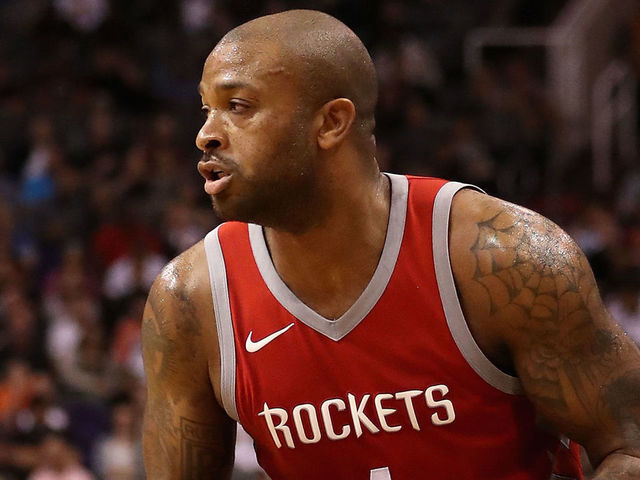 PHOENIX, AZ - NOVEMBER 16: PJ Tucker #4 of the Houston Rockets handles the ball during the first half of the NBA game against the Phoenix Suns at Talking Stick Resort Arena on November 16, 2017 in Phoenix, Arizona.