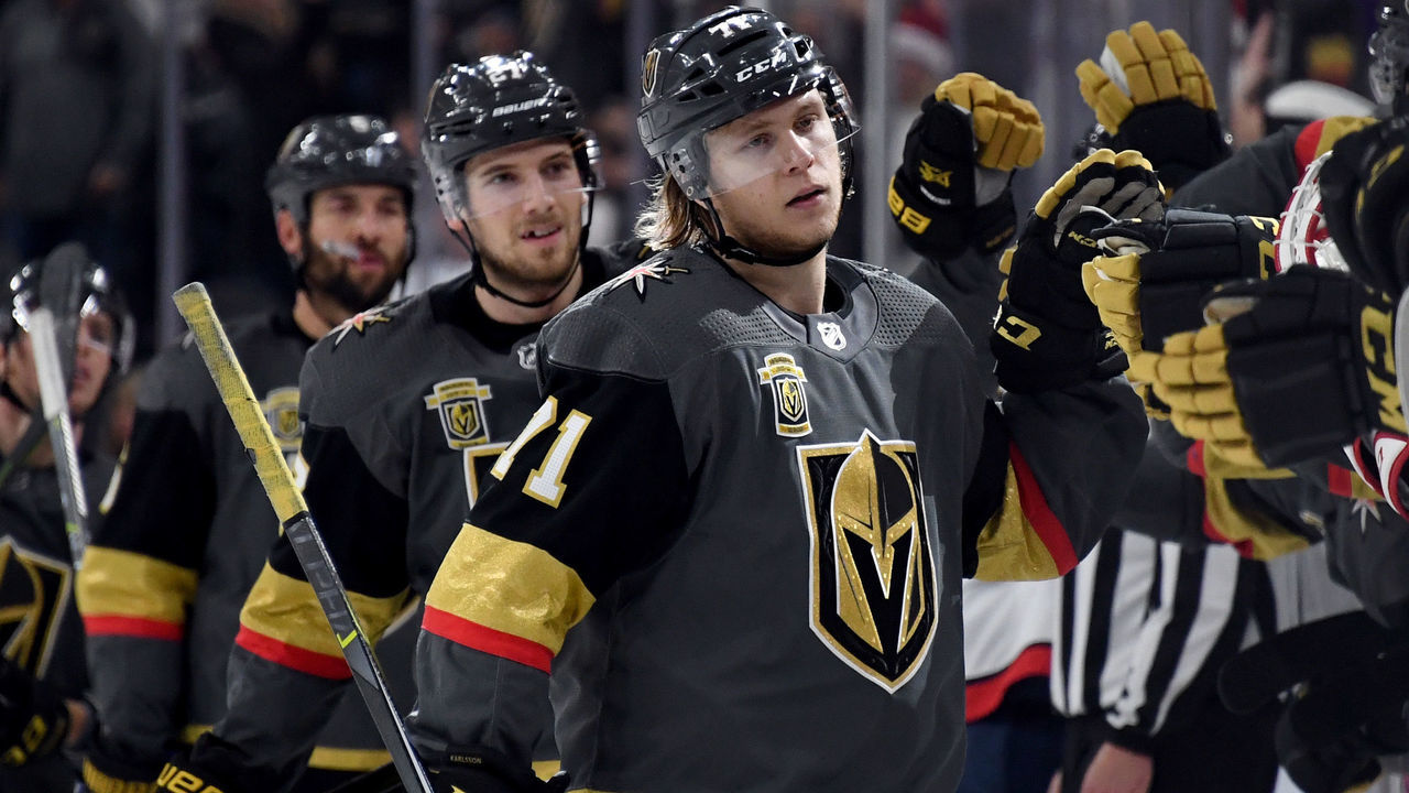 LAS VEGAS, NV - DECEMBER 23: William Karlsson #71 of the Vegas Golden Knights celebrates with teammates after scoring a first-period goal against the Washington Capitals during their game at T-Mobile Arena on December 23, 2017 in Las Vegas, Nevada. The Golden Knights won 3-0.