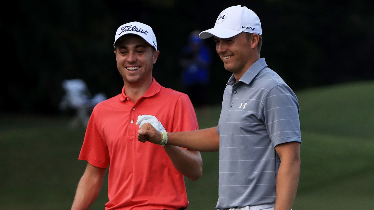 HONOLULU, HI - JANUARY 12: Justin Thomas of the United States is congratulated by Jordan Spieth of the United States after chipping in on the tenth hole during the first round of the Sony Open In Hawaii at Waialae Country Club on January 12, 2017 in Honolulu, Hawaii.