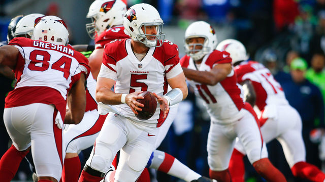 SEATTLE, WA - DECEMBER 31: Quarterback Drew Stanton #5 of the Arizona Cardinals looks to hand off against the Seattle Seahawks in the first quarter at CenturyLink Field on December 31, 2017 in Seattle, Washington.