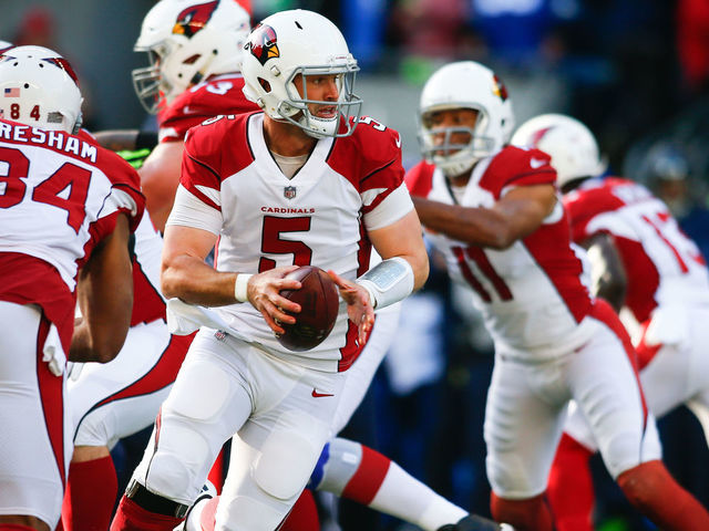SEATTLE, WA - DECEMBER 31: Quarterback Drew Stanton #5 of the Arizona Cardinals looks to hand off against the Seattle Seahawks in the first quarter at CenturyLink Field on December 31, 2017 in Seattle, Washington.