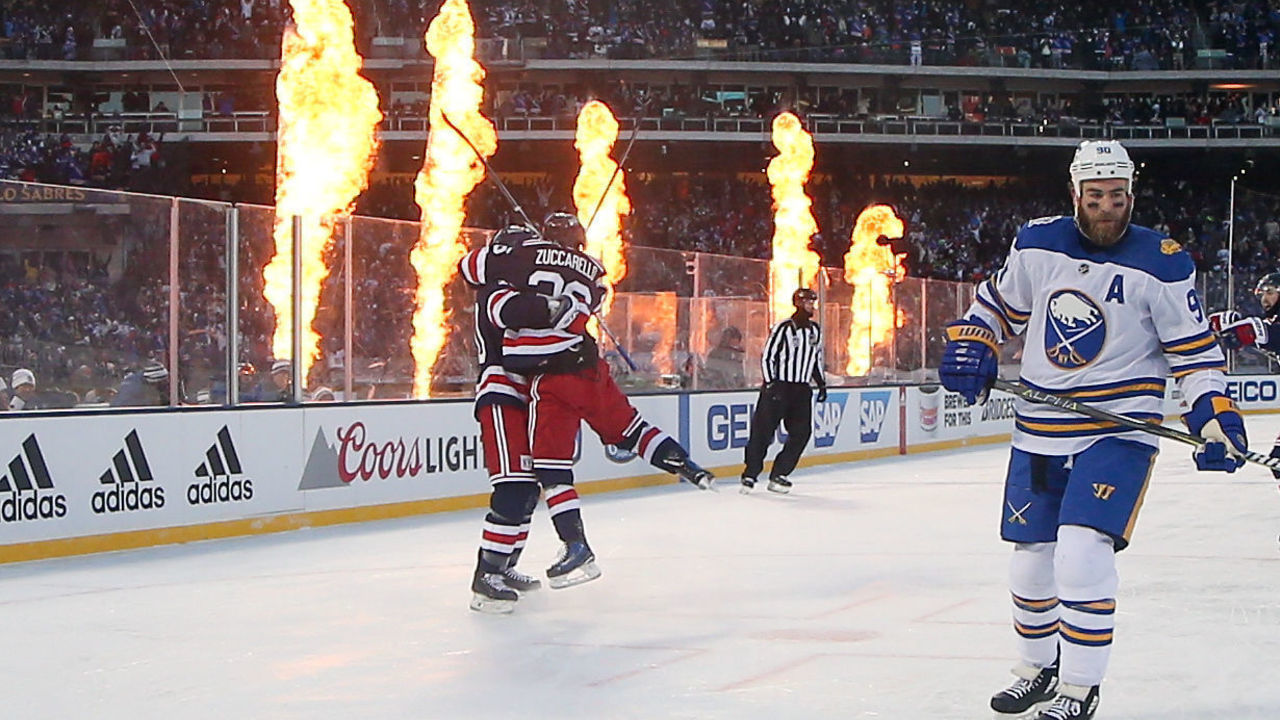 FLUSHING, NY - JANUARY 01: New York Rangers left wing J.T. Miller (10) celebrates with teammate New York Rangers right wing Mats Zuccarello (36) after scoring the game winning goal during overtime of the 2018 Winter Classic between the New York Rangers and the Buffalo Sabres on January 1, 2018, at Citi Field in Flushing, NY.
