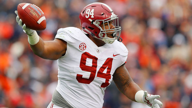 AUBURN, AL - NOVEMBER 25: Da'Ron Payne #94 of the Alabama Crimson Tide reacts after recovering a fumble during the first quarter against the Auburn Tigers at Jordan Hare Stadium on November 25, 2017 in Auburn, Alabama.
