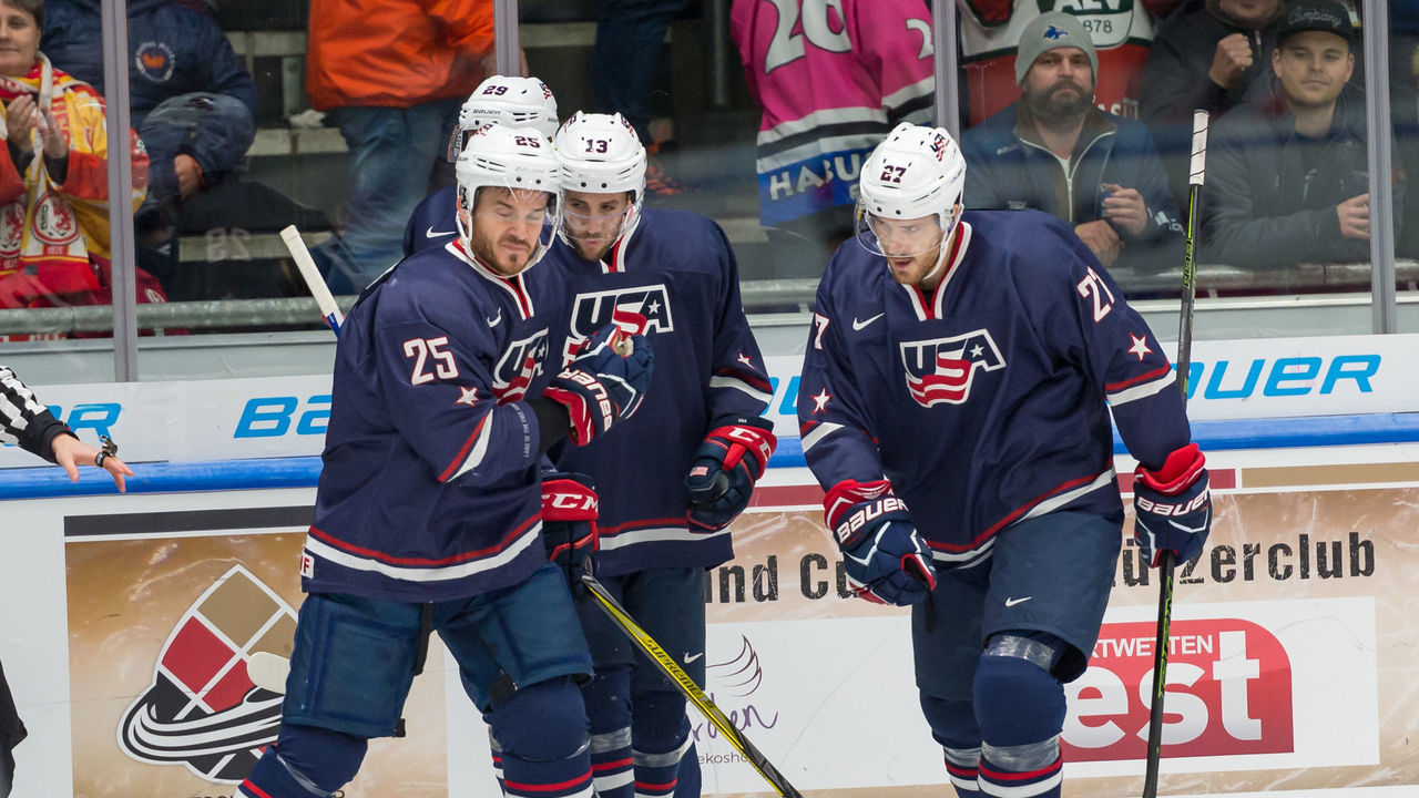 AUGSBURG, GERMANY - NOVEMBER 11: Kolarik of USA, Ryan Stoa of USA, Ryan Gunderson of USA and Bobby Sanguinetti of USA celebrate their team`s goal during the Deutschland Cup 2017 match between Russia and USA at Curt-Frenzel-Stadion on November 11, 2017 in Augsburg, Germany.