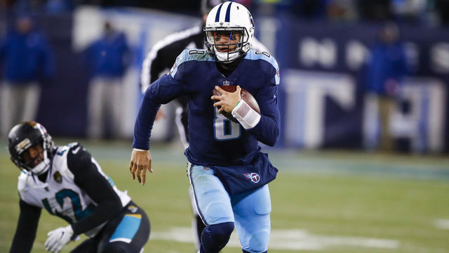 NASHVILLE, TN - DECEMBER 31: Quarterback Marcus Mariota #8 of the Tennessee Titans carries the ball against the Jacksonville Jaguars at Nissan Stadium on December 31, 2017 in Nashville, Tennessee.