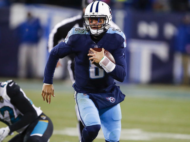 NASHVILLE, TN - DECEMBER 31: Quarterback Marcus Mariota #8 of the Tennessee Titans carries the ball against the Jacksonville Jaguars at Nissan Stadium on December 31, 2017 in Nashville, Tennessee.