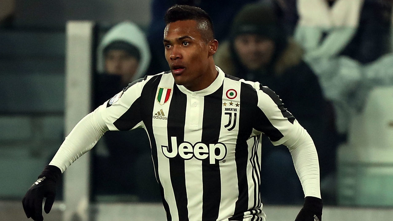 TURIN, ITALY - DECEMBER 23: Alex Sandro of Juventus in action during the serie A match between Juventus and AS Roma on December 23, 2017 in Turin, Italy.