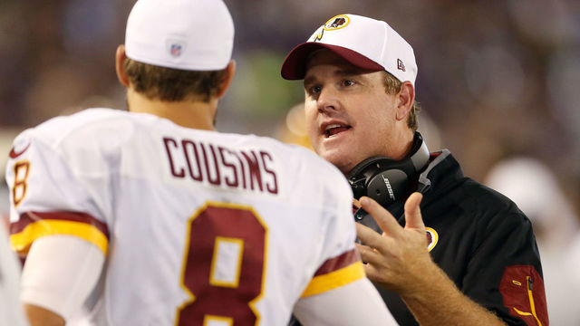 BALTIMORE, MD - AUGUST 29: Head coach Jay Gruden of the Washington Redskins talks with quarterback Kirk Cousins #8 of the Washington Redskins in the fourth quarter of a preseason game against the Baltimore Ravens at M&T Bank Stadium on August 29, 2015 in Baltimore, Maryland.