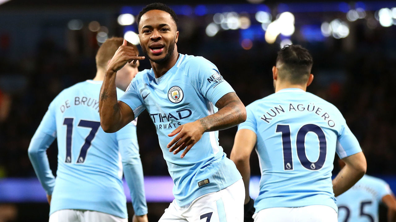 MANCHESTER, ENGLAND - JANUARY 02: Raheem Sterling of Manchester City celebrates after scoring his sides first goal during the Premier League match between Manchester City and Watford at Etihad Stadium on January 2, 2018 in Manchester, England.